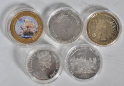 A group of five silver proof commemorative coins t