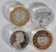 A group four silver proof commemorative coins to i