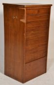 A mid century oak office factory filing cabinet of