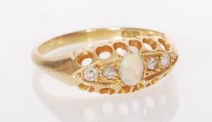 A stamped 18ct gold ladies ring set with an oval c
