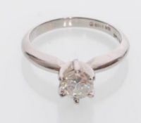 An 18ct white gold solitaire ring inset with a bri