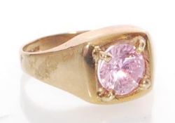 A hallmarked 9ct gold and pink stone ring. Hallmar