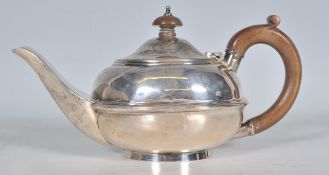 An early 20th Century silver hallmarked teapot of