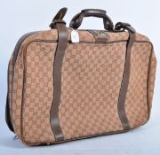 PETER WYNGARDE'S ORIGINAL VINTAGE GUCCI TRAVEL SUI