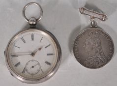 A 19th Century Victorian silver pocket watch having a white enamelled face with subsidiary dial