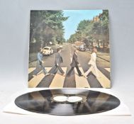 A vinyl long play LP record album by The Beatles – Abbey Road – Original Apple Records 1st U.K.