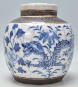 A 19th Century Chinese lidded blue and white crackle glaze ginger jar having hand painted blue and