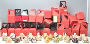 A group of twenty seven Kevin Francis ceramic face pots in the form of various mythical characters