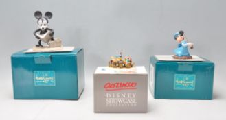 A group of three Walt Disney ceramic figures to include Olszewski Disney Snow White And The Seven