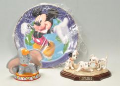 A group of three Disney Royal Doulton ceramic figures and plate to include The Mickey Mouse