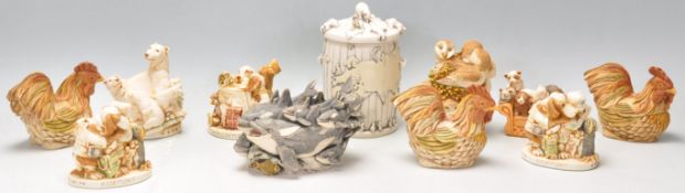 A collection of eleven Harmony Kingdom resin novelty figurines / boxes to include three cockerel