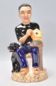 A Kevin Francis limited edition character jug in the form of Adam Binder. Limited edition number 65.