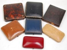 A mixed group of seven vintage jewellery boxes to include blue leather example with gilt tooled