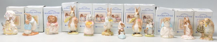 A good group of twelve Royal Albert ceramic figures in 'The World Of Beatrix Potter Collection' to