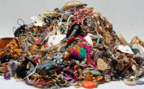 A large collection of vintage and later costume jewellery to include multiple necklace with gold and