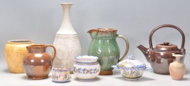 A collection of vintage retro 20th Century studio pottery to include a Buckfast Abbey ceramics green