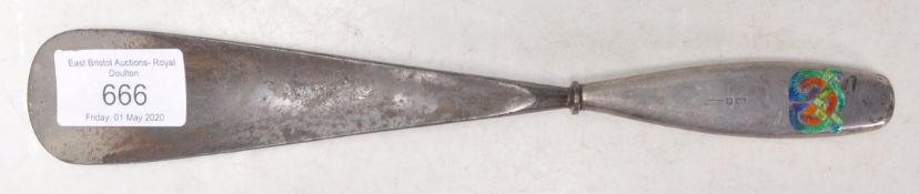 An early 20th Century Liberty Art Nouveau silver handled shoe horn having a coloured enamelled
