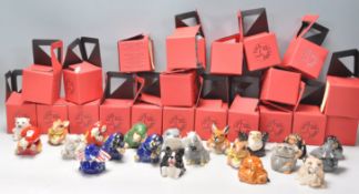 A group of twenty one Kevin Francis ceramic face pots in the form of various different animals to