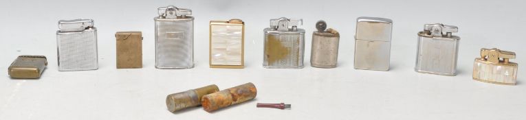 A collection of vintage retro cigarette lighters mostly by Ronson to include a gilt mother of