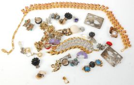 A collection of vintage 20th Century costume jewellery to include a wide selection of clip on
