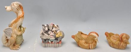 A group of four Harmony Kingdom cast resin figurines to include Tamira's Treasure,  House Party (