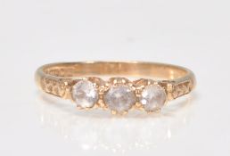 A 9ct gold 3 stone diamond ring. The 3 diamonds estimated diamond weight 0.25cts. Birmingham
