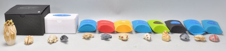 A collection of twelve mostly small Adam Binder animals related netsuke style figurines to include a