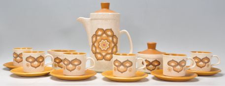 A vintage retro 20th Century Royal Worcester Palissy pattern coffee service compressing of six