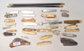 A collection of vintage pen knives dating from the early and mid 20th Century to include celluloid