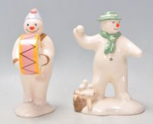 Two Royal Doulton ceramic figures from 'The Snowman Gift Collection' to include Bass Drummer Snowman