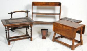 A collection of antique furniture to include a small barley oak twist table having carved floral