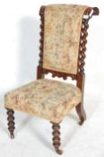 A 19th Century Victorian antique rosewood prie-dieu prayer chair having turned bobbin legs