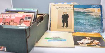 A mixed collection of vinyl long play LP record albums of varying artists and genres to include