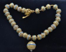 An early 20th century Venetian Murano hollow glass bead necklace. The necklace strung with hollow