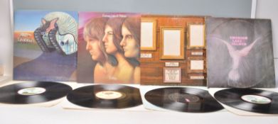 A group of four vinyl long play LP record albums by Emerson Lake & Palmer. Albums include –