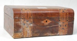 A late 19th / early 20th Century tunbridge ware wooden treen box having banded geometric