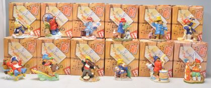 A good group of twelve Royal Doulton ceramic figures from 'The Paddington Bear Collection' to