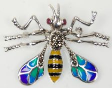 A stamped 925 silver bug brooch in the form of a wasp having plique a jour enamelled wings set
