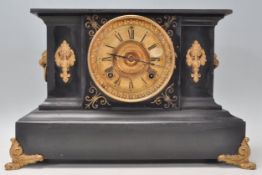 A Victorian 19th century marble and gilt metal 8 day mantel clock. The clock being raised on