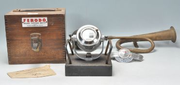 A group of vintage car related items to include a boxed Ferodo brake testing meter, a Cowley