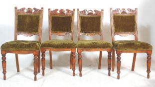 A group of four late 19th century mahogan Art Nouveau mahogany dining chairs having solid frames