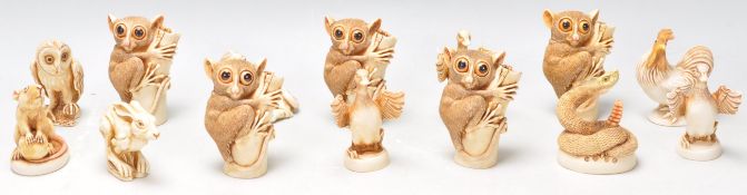 A collection of Harmony Kingdom resin figurines to include five bush baby figurines, hare, rat, owl,