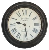A 20th Century reproduction Victoria Station, railway London wall clock having a white face with