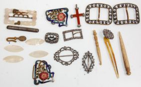 A mixed group of items to include sewing related items, needle case, mother of pearl engraved discs,