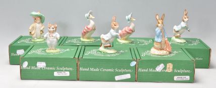 A group of seven Beswick Beatrix Potter ceramic figurines to include Benjamin Button, Tom Kitten,