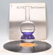 A vinyl long play LP record album by Home– The Alchemist – Original CBS 1st U.K. Press – S 65550