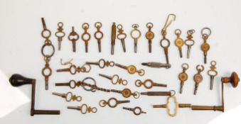 A group of thirty antique and vintage watch keys together with three clock keys.