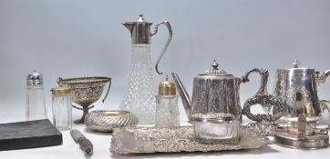 A good mix of silver plate wares dating form the early 20th Century to include a decorative floral