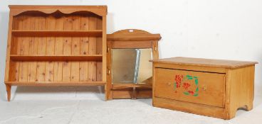 A Victorian style pine hanging shelf together with a Victorian pine wall mirror with shaped