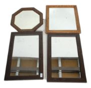 A group of four vintage 20th Century wooden framed wall mirrors to include an octagonal mirror
